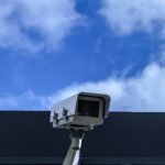 white security camera at daytime